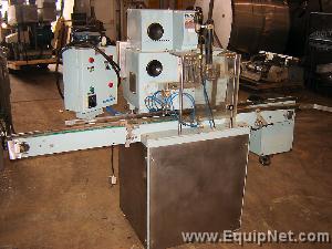 MAG COTTONER WITH CONVEYOR BELT