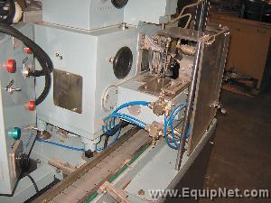 MAG COTTONER WITH CONVEYOR BELT