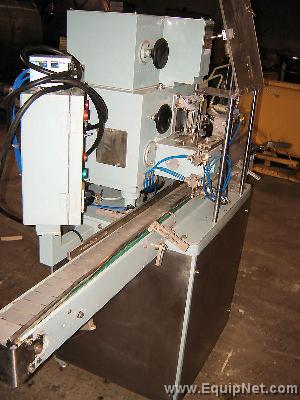 MAG COTTONER WITH CONVEYOR BELT