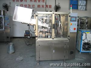 Automatic plastic tube filler and sealer.NEW.