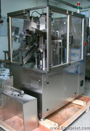 Automatic plastic tube filler and sealer.NEW.