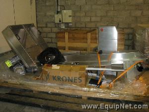 Krones K747 Autocol Labeller, Pioneer Feed Elevator, Vacuum pump, Control Panel, & Guarding system.