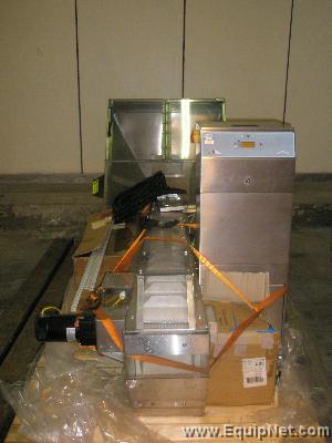 Krones K747 Autocol Labeller, Pioneer Feed Elevator, Vacuum pump, Control Panel, & Guarding system.