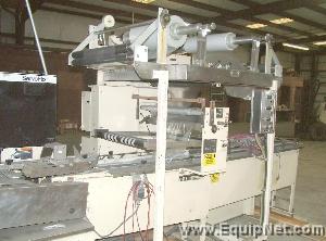FMC model WS-24 servoflo hi speed shrink wrapper