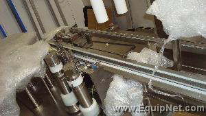 TL Systems FSM Walking Beam High Speed Vial Filler - Plugger