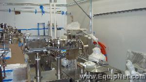 TL Systems FSM Walking Beam High Speed Vial Filler - Plugger