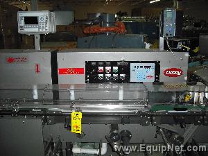 Doboy Model J Wrapper with 3 belt servo in line product feeder