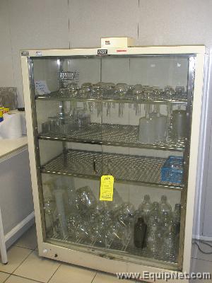 Leec, Glass instruments electrically heated drying cabinet, floor mounted, with 4 shelves.