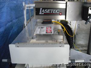 LASETEC LASER CODE PRINTER WITH BAR CODE READER AND CONVEYOR