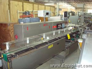 Doboy Model J Wrapper with 3 belt servo in line product feeder