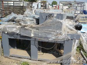 Shrink wrapping machine
