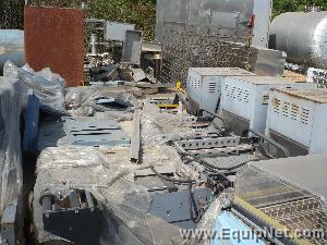 Shrink wrapping machine